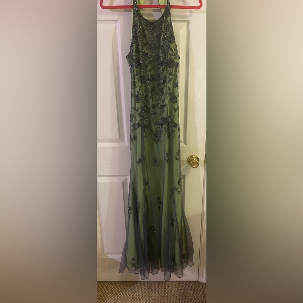Large blue and light green beaded backless prom dress gently warn